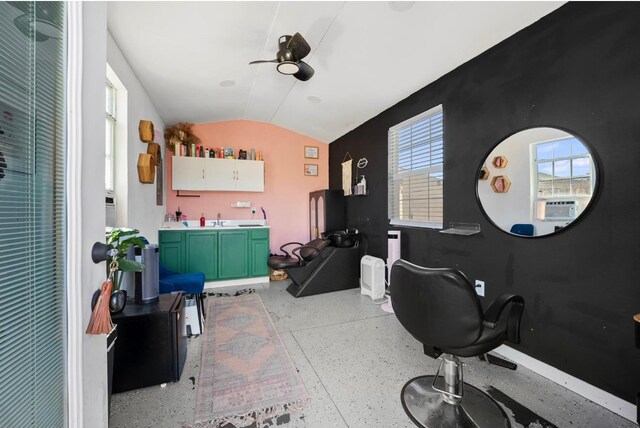 office area featuring sink, vaulted ceiling, and ceiling fan