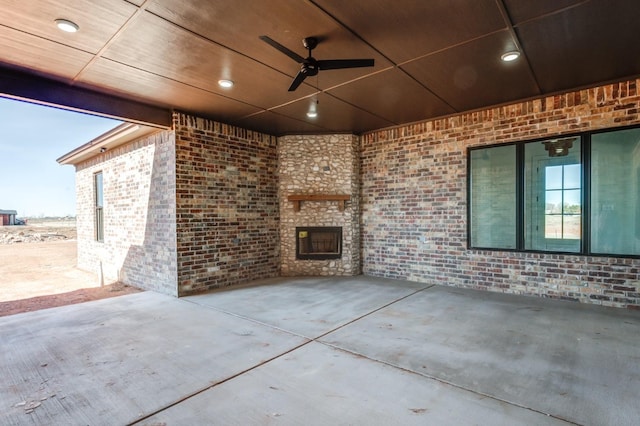 view of patio featuring ceiling fan