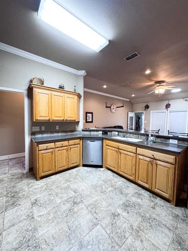 kitchen with dishwasher, sink, ornamental molding, ceiling fan, and kitchen peninsula