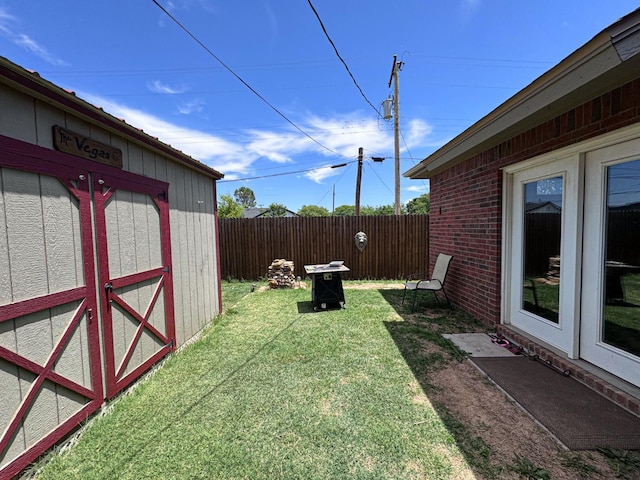 view of yard with a shed