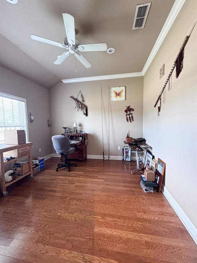 office featuring dark wood-type flooring, ornamental molding, ceiling fan, and vaulted ceiling