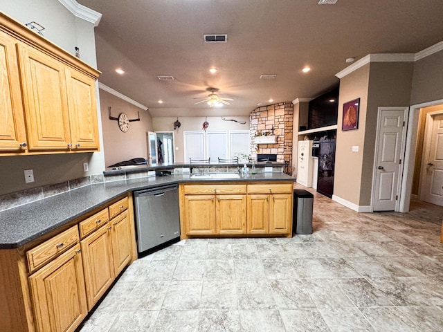 kitchen with sink, ceiling fan, ornamental molding, stainless steel dishwasher, and kitchen peninsula