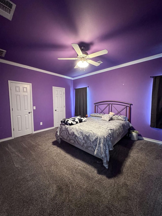 carpeted bedroom featuring ornamental molding and ceiling fan