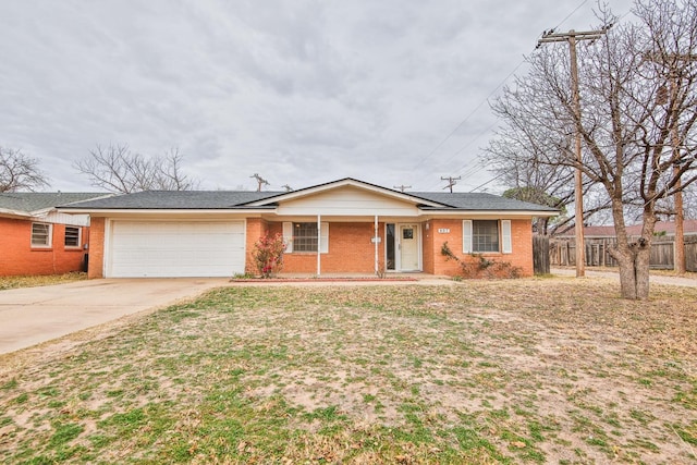 single story home featuring a garage and covered porch