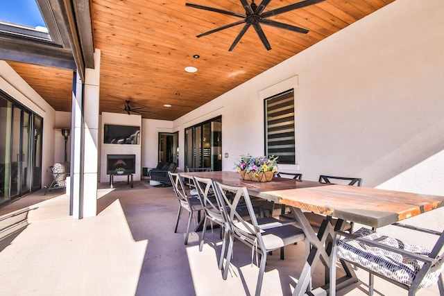 view of patio / terrace featuring ceiling fan