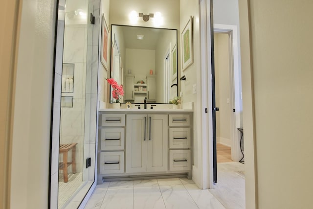 bathroom with vanity and walk in shower