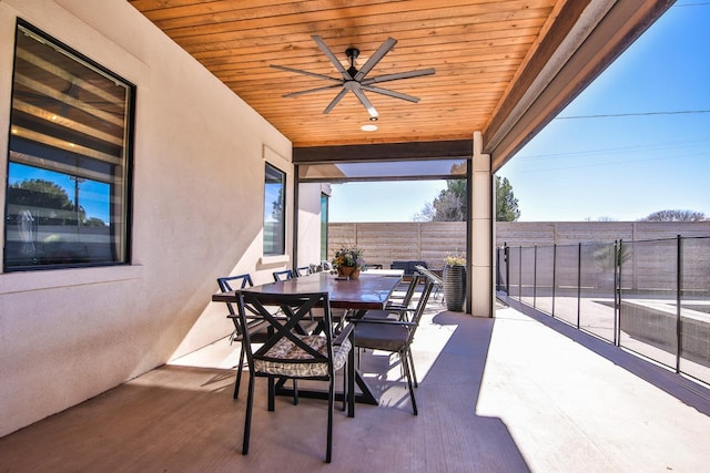 view of patio featuring ceiling fan