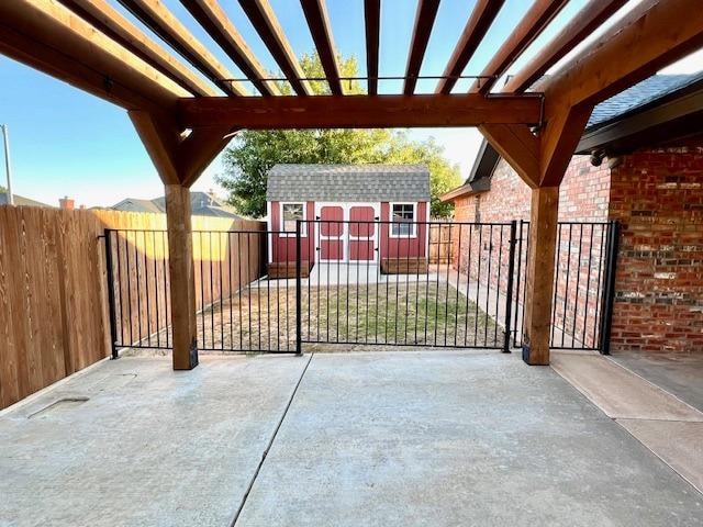 view of patio with a shed