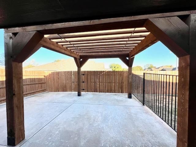 view of patio featuring a pergola