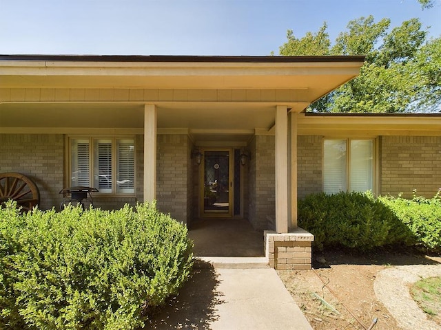 property entrance with a porch