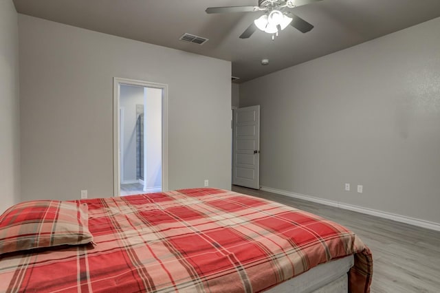 bedroom featuring ceiling fan and hardwood / wood-style floors