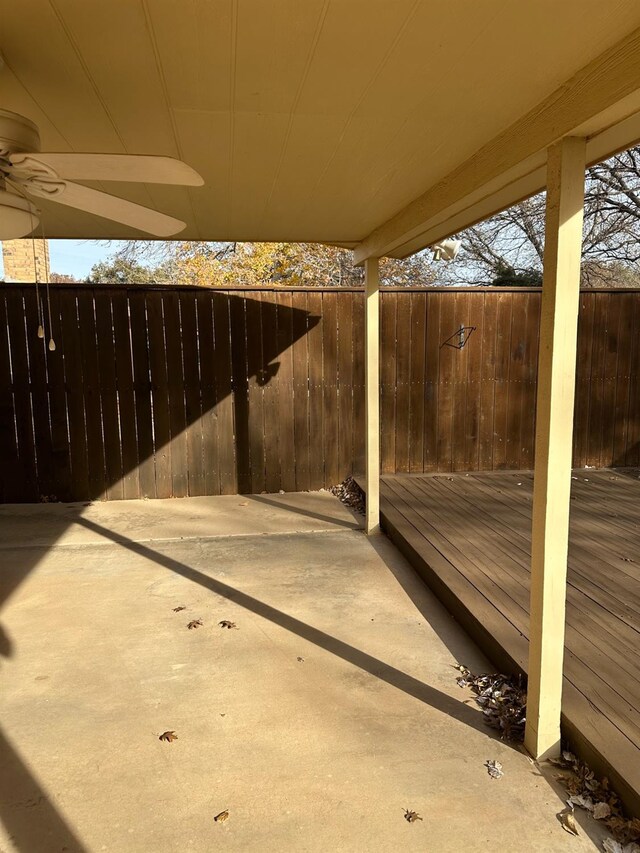 view of patio / terrace with a wooden deck and ceiling fan