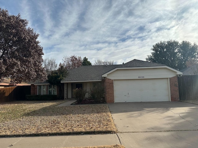 single story home with a garage