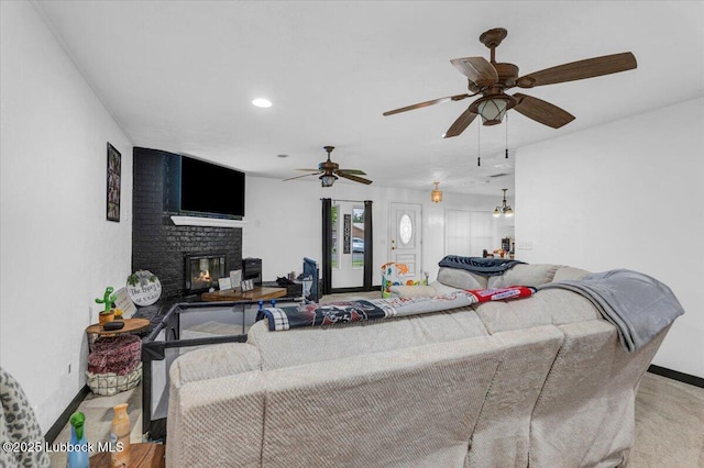 110 E 18th St, Littlefield, TX 79339 - living area featuring a brick fireplace, baseboards, a ceiling fan, and recessed lighting