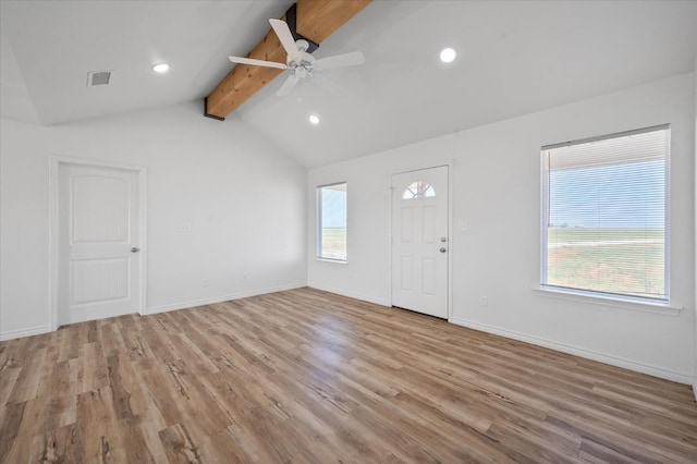 entryway featuring ceiling fan, light hardwood / wood-style floors, and lofted ceiling with beams