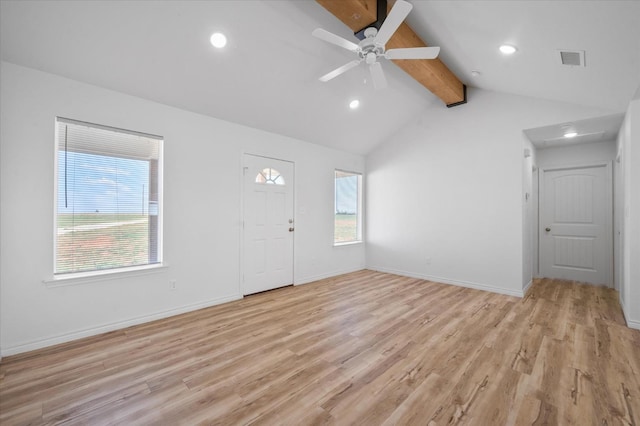 unfurnished living room with lofted ceiling with beams, ceiling fan, and light hardwood / wood-style floors