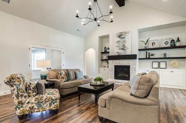 living room featuring a stone fireplace, dark wood-type flooring, built in features, and high vaulted ceiling