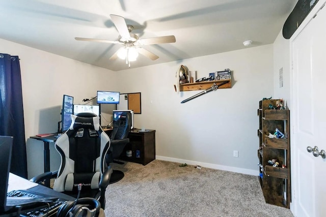 office area with ceiling fan and light colored carpet