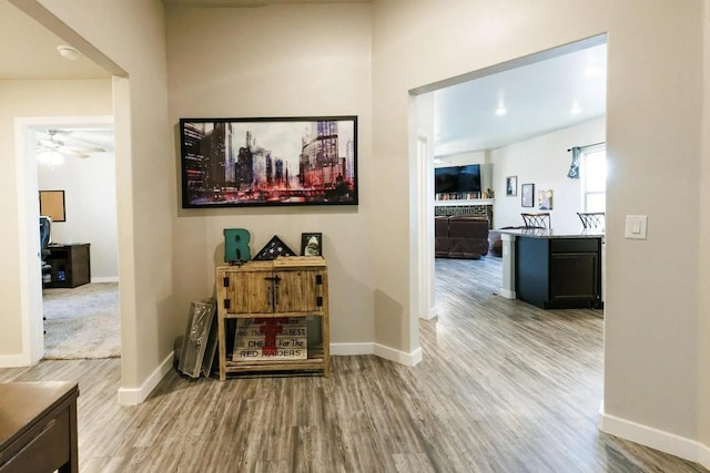 hallway with light wood-type flooring