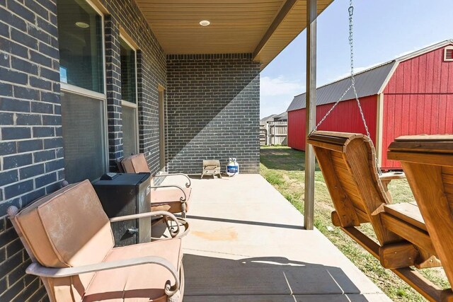 view of patio / terrace with an outdoor structure