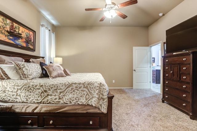 bedroom with light carpet and ceiling fan