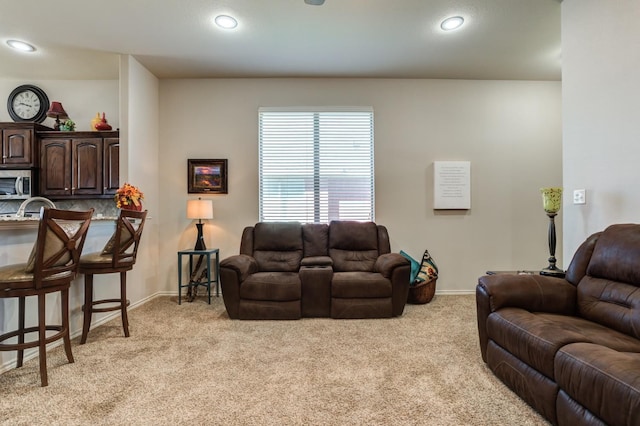 living room featuring light colored carpet