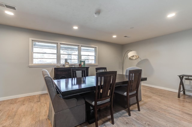 dining room featuring light hardwood / wood-style flooring