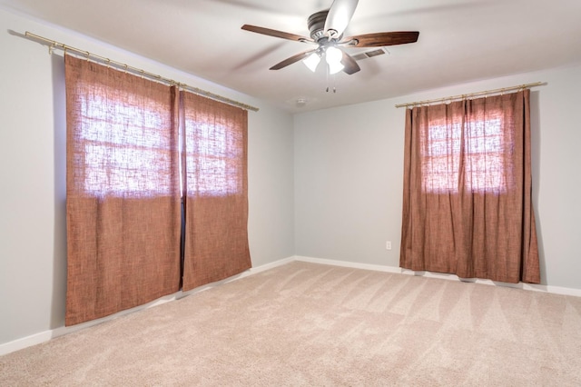 unfurnished bedroom featuring ceiling fan and carpet flooring