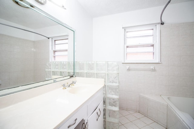 full bath with a tile shower, tiled bath, a textured ceiling, tile patterned flooring, and tile walls
