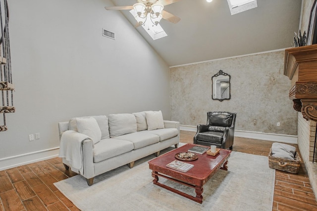 living room with dark wood-type flooring, ceiling fan, a skylight, and high vaulted ceiling