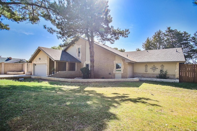 exterior space featuring a garage and a lawn