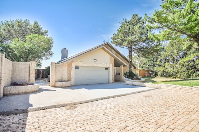 exterior space with a garage