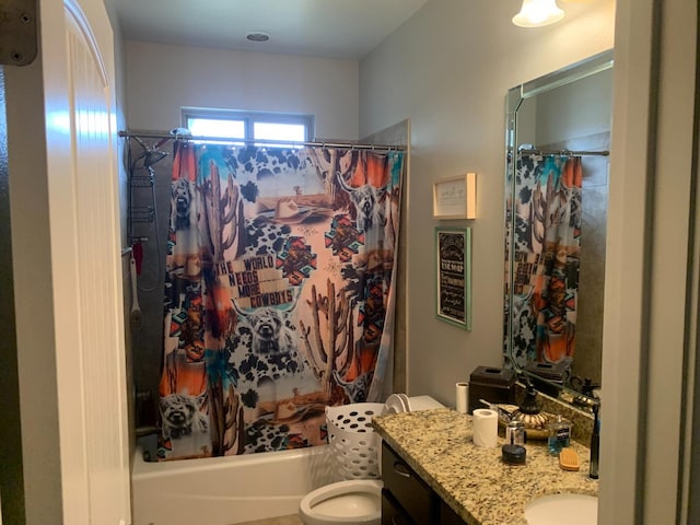 full bathroom with vanity, shower / tub combo with curtain, and toilet