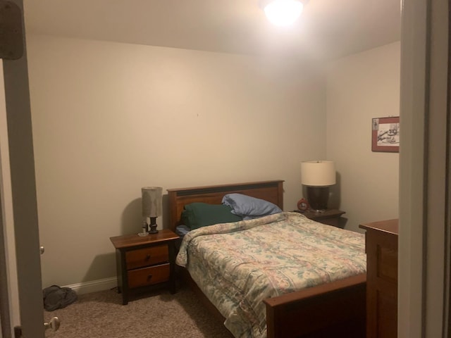 bedroom with light carpet