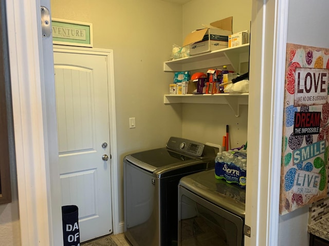 laundry room featuring separate washer and dryer