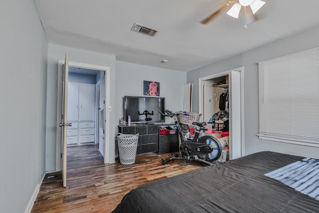 bedroom featuring dark hardwood / wood-style floors and ceiling fan