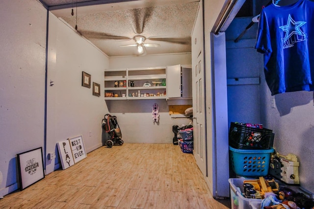 storage room featuring ceiling fan