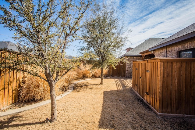 view of yard with fence