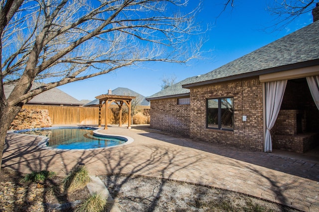 view of pool with a patio area, a fenced backyard, a fenced in pool, and a pergola