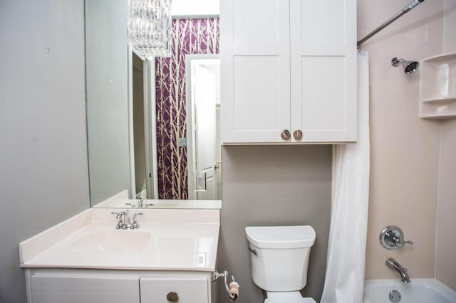 full bath featuring toilet, shower / bathtub combination with curtain, and vanity