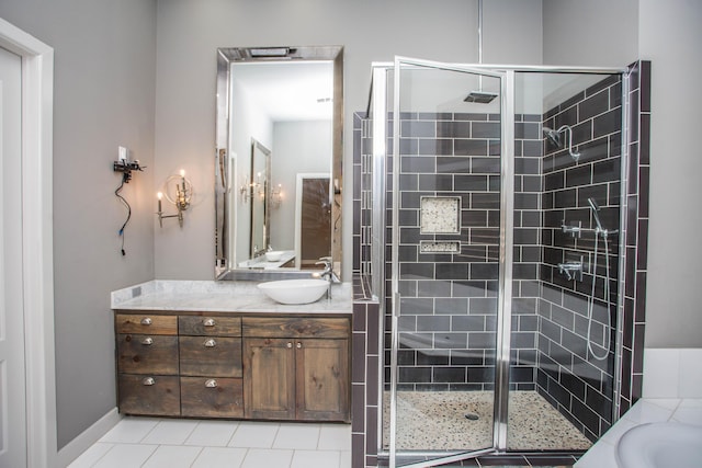 bathroom with a stall shower, a bathing tub, tile patterned floors, and vanity