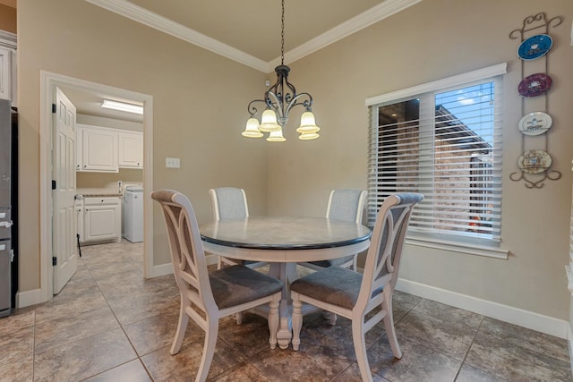 tiled dining area featuring a notable chandelier and crown molding