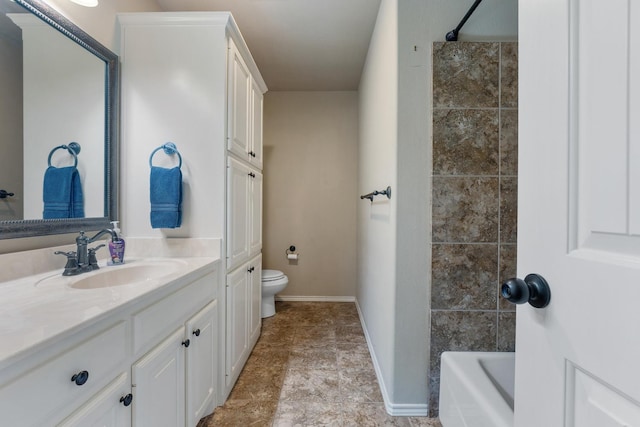 full bathroom featuring vanity, tub / shower combination, and toilet