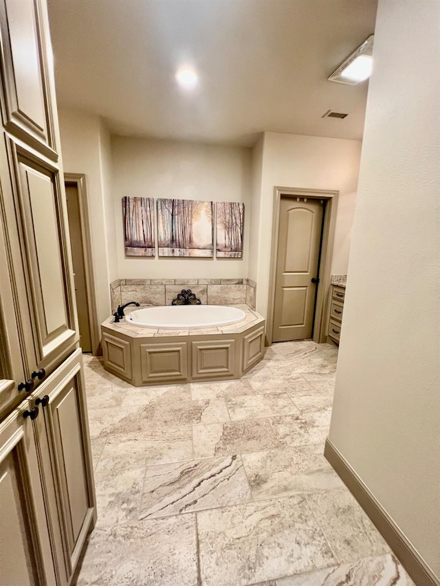 bathroom with a washtub