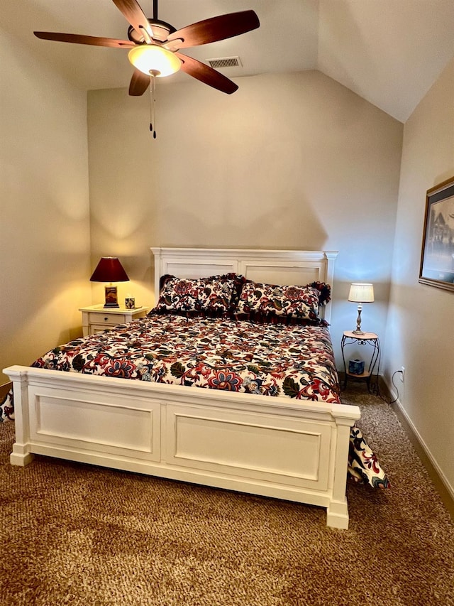 bedroom with lofted ceiling, ceiling fan, and carpet