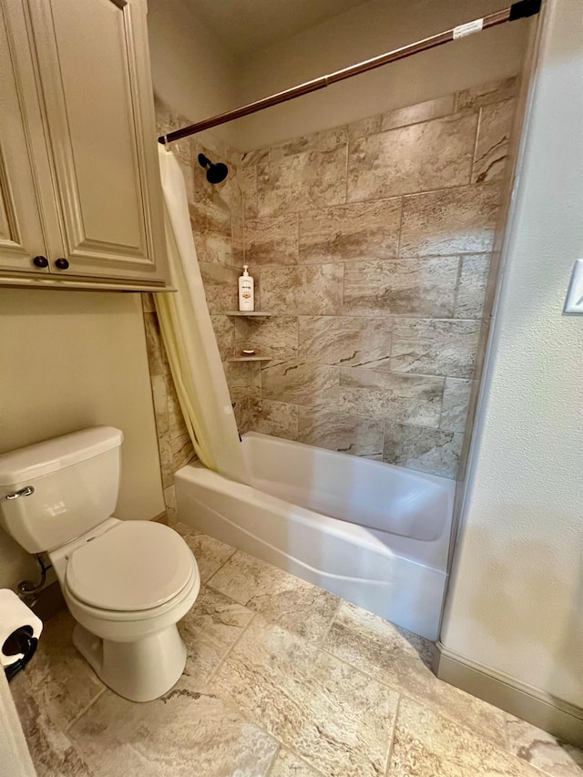 bathroom with shower / bathtub combination with curtain and toilet