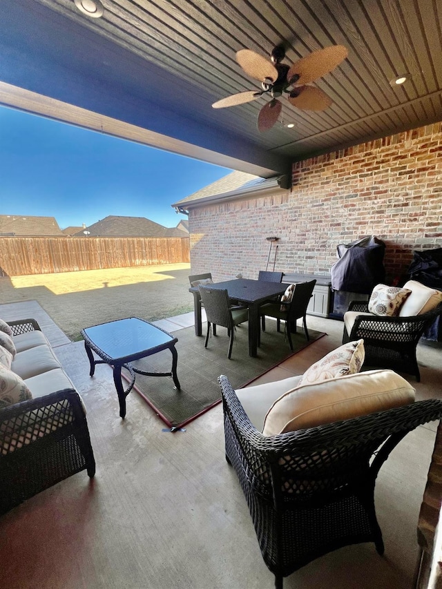 view of patio / terrace with an outdoor living space and ceiling fan