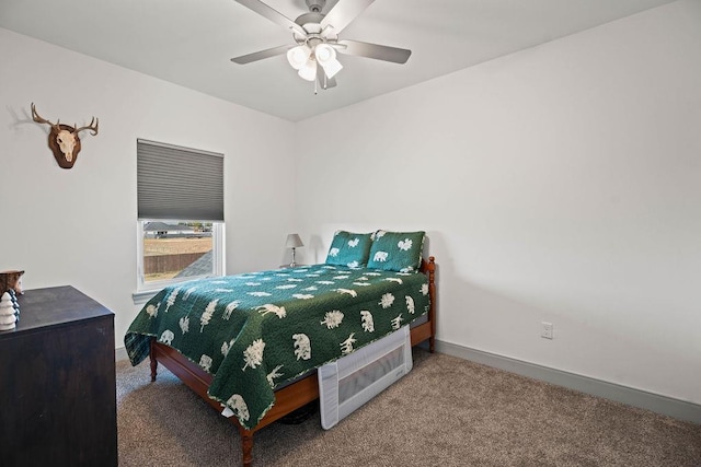 bedroom featuring baseboards, carpet floors, and ceiling fan