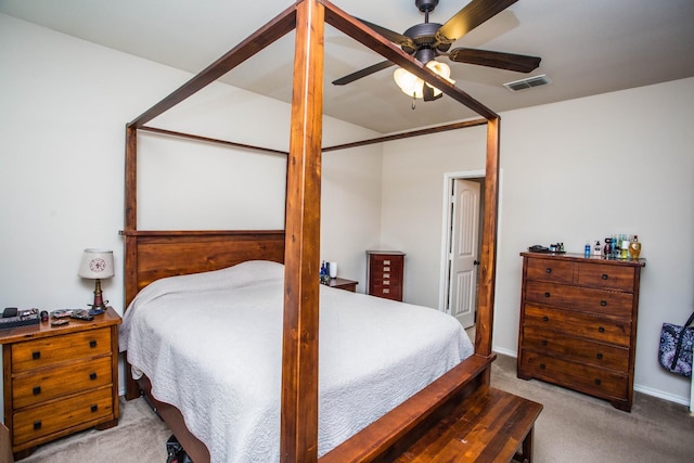 bedroom featuring light colored carpet and ceiling fan