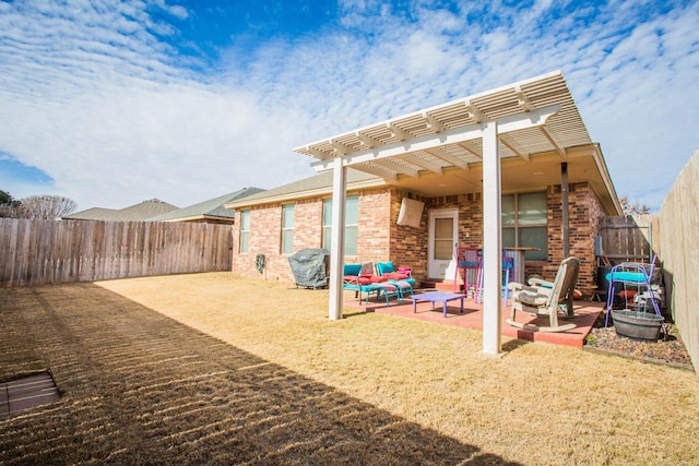 rear view of property with a pergola, an outdoor hangout area, and a patio